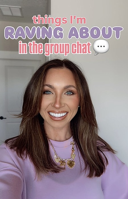 Smiling woman sharing group chat highlights.